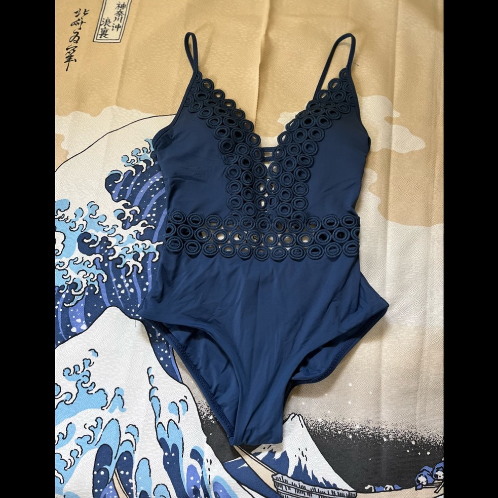 Navy Blue BECCA 1 pc swimsuit Laced with Loops NWT